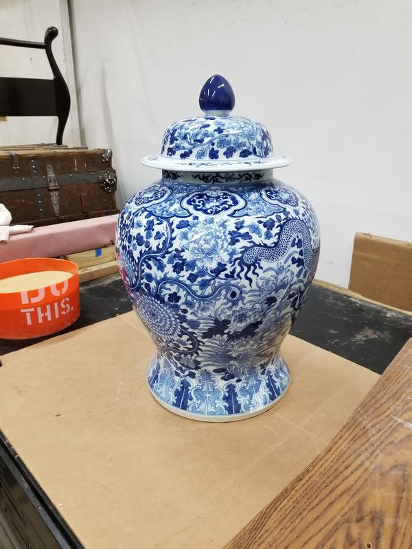Master craftsman working on porcelain